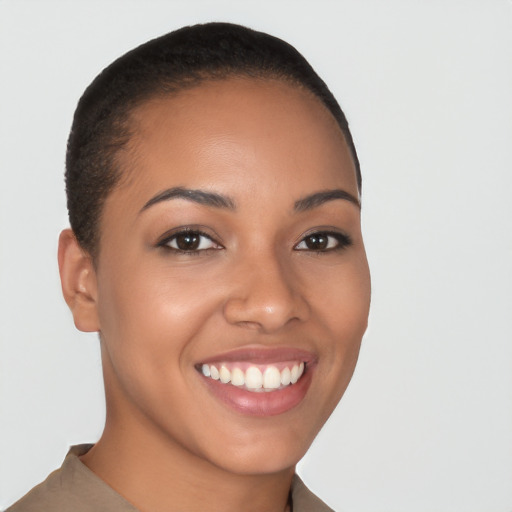 Joyful latino young-adult female with short  brown hair and brown eyes