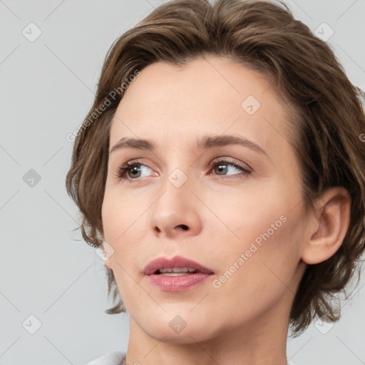 Neutral white young-adult female with medium  brown hair and brown eyes