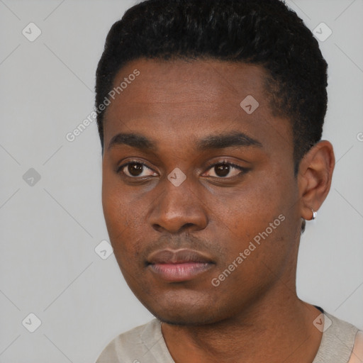 Neutral black young-adult male with short  black hair and brown eyes