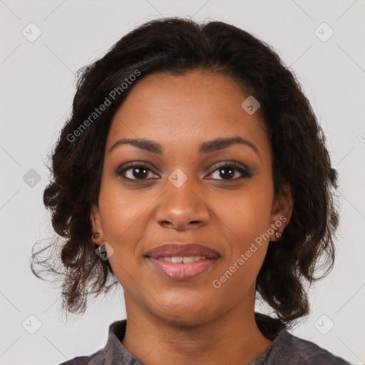 Joyful black young-adult female with medium  brown hair and brown eyes