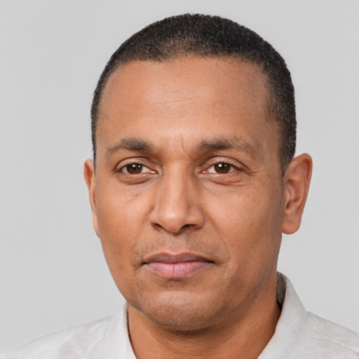 Neutral white adult male with short  black hair and brown eyes