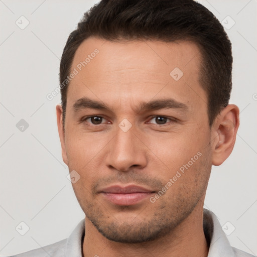 Neutral white young-adult male with short  brown hair and brown eyes