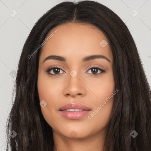 Joyful latino young-adult female with long  black hair and brown eyes