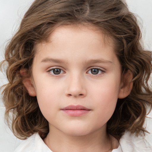 Neutral white child female with medium  brown hair and brown eyes