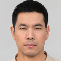 Neutral asian young-adult male with short  black hair and brown eyes