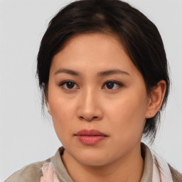 Neutral asian young-adult female with medium  brown hair and brown eyes