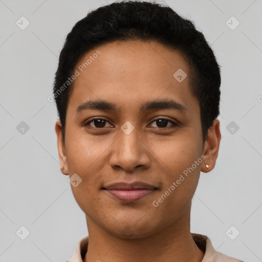 Joyful latino young-adult male with short  black hair and brown eyes