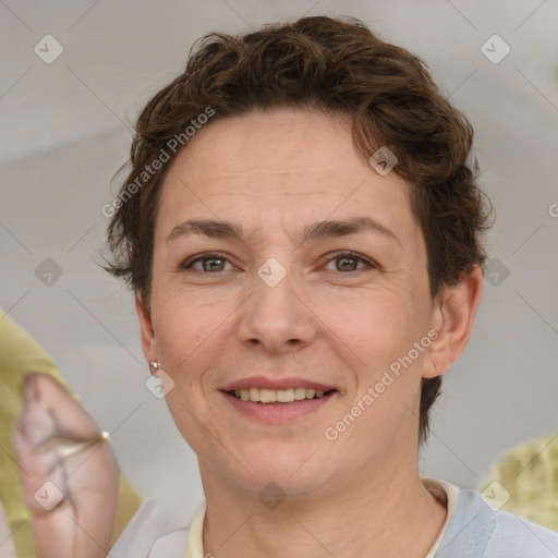 Joyful white adult female with short  brown hair and brown eyes