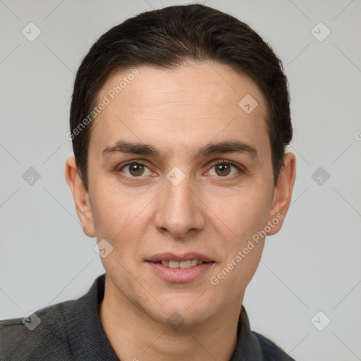 Joyful white adult male with short  brown hair and grey eyes