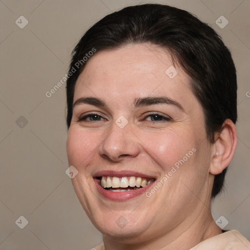 Joyful white adult female with medium  brown hair and brown eyes