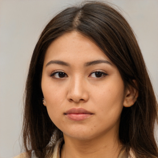 Neutral asian young-adult female with long  brown hair and brown eyes