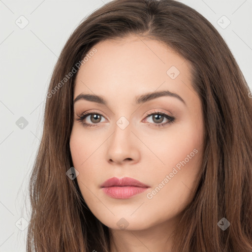 Neutral white young-adult female with long  brown hair and brown eyes