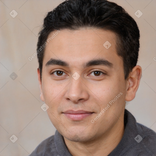 Joyful white young-adult male with short  black hair and brown eyes