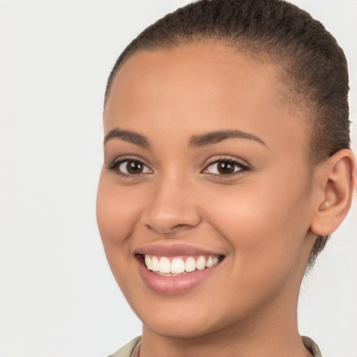 Joyful white young-adult female with short  brown hair and brown eyes