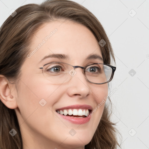 Joyful white young-adult female with long  brown hair and blue eyes