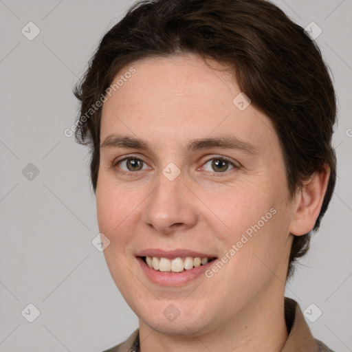 Joyful white adult female with medium  brown hair and brown eyes