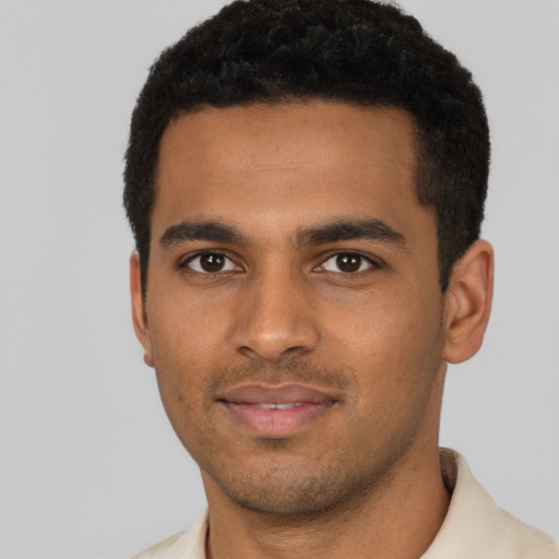 Neutral black young-adult male with short  black hair and brown eyes