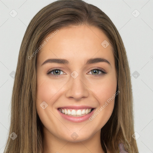 Joyful white young-adult female with long  brown hair and brown eyes