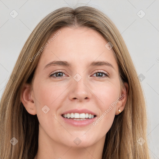 Joyful white young-adult female with long  brown hair and grey eyes