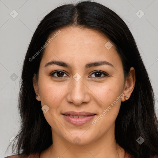 Joyful latino young-adult female with long  brown hair and brown eyes