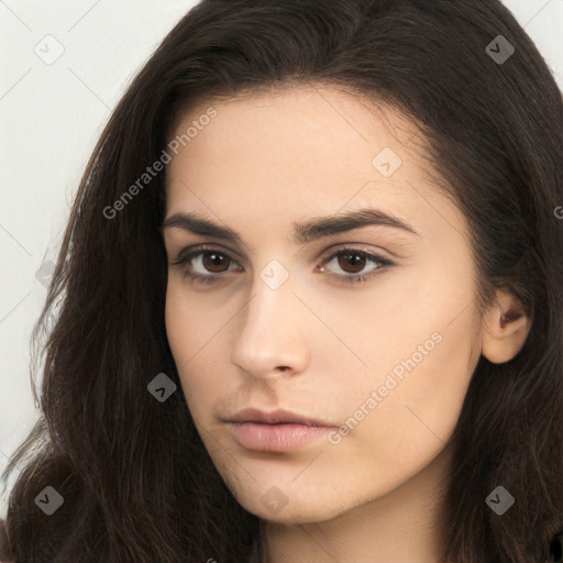 Neutral white young-adult female with long  brown hair and brown eyes