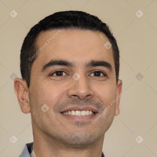 Joyful white young-adult male with short  black hair and brown eyes