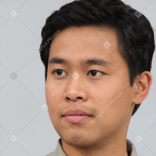 Neutral asian young-adult male with short  black hair and brown eyes