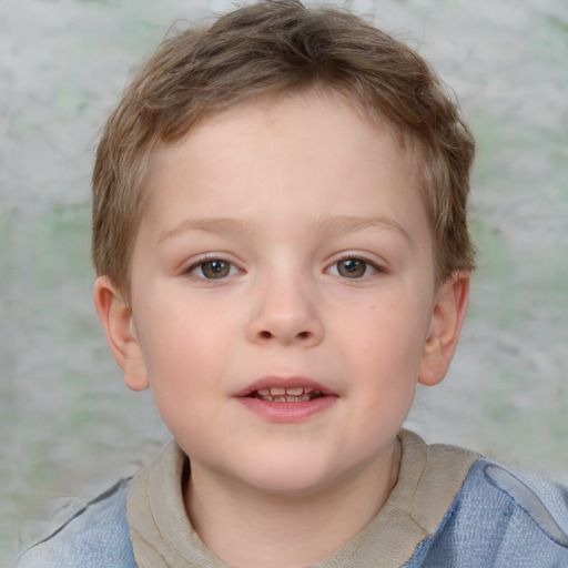 Joyful white child male with short  brown hair and blue eyes