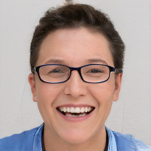 Joyful white young-adult female with short  brown hair and blue eyes