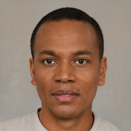 Neutral black young-adult male with short  black hair and brown eyes