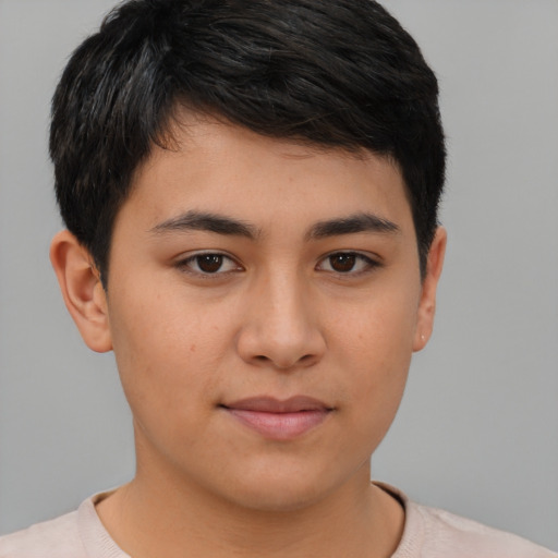 Joyful asian young-adult male with short  brown hair and brown eyes
