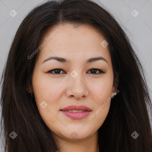 Joyful asian young-adult female with long  brown hair and brown eyes