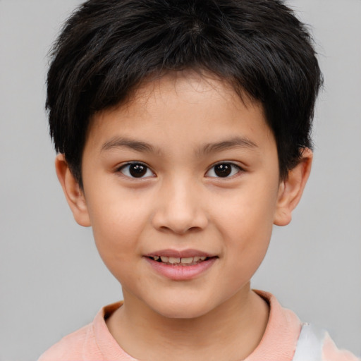 Joyful white child female with short  brown hair and brown eyes