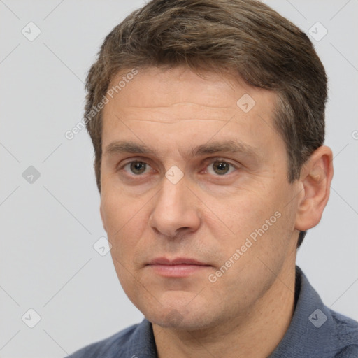 Neutral white adult male with short  brown hair and brown eyes