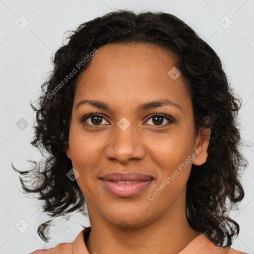 Joyful black young-adult female with medium  brown hair and brown eyes