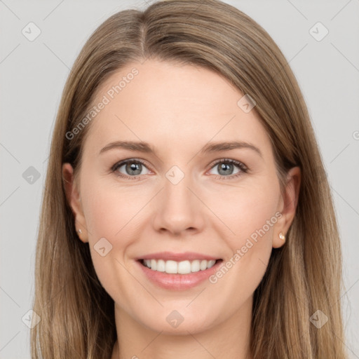 Joyful white young-adult female with long  brown hair and grey eyes