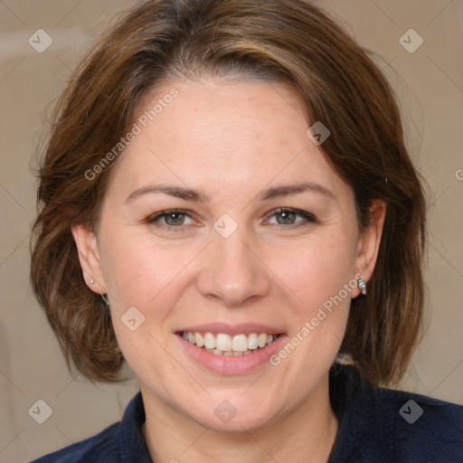 Joyful white adult female with medium  brown hair and grey eyes