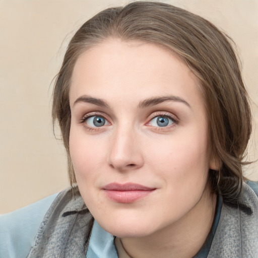 Neutral white young-adult female with medium  brown hair and blue eyes