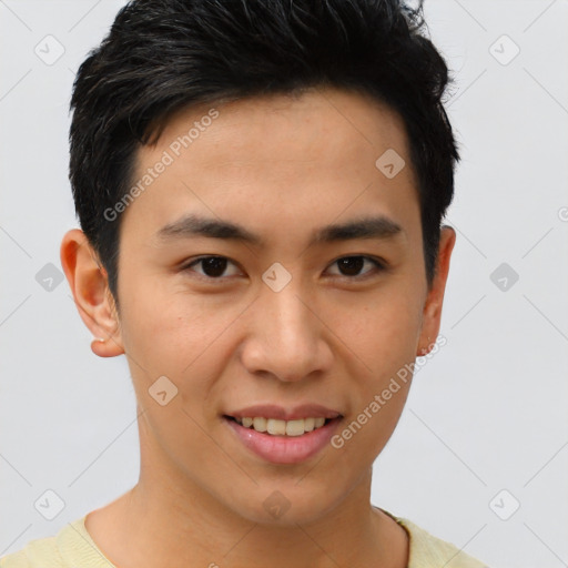 Joyful asian young-adult male with short  brown hair and brown eyes