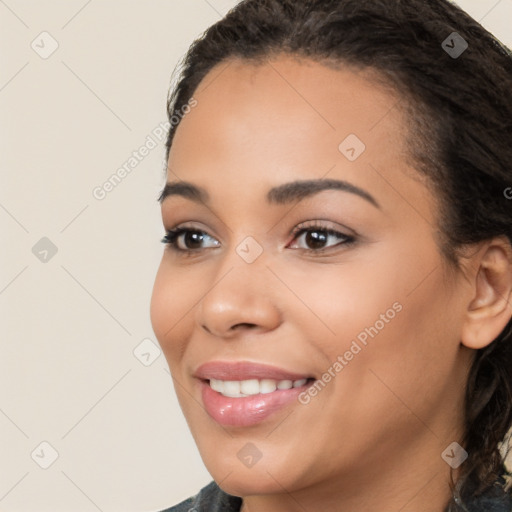 Joyful latino young-adult female with long  black hair and brown eyes