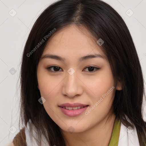 Joyful asian young-adult female with long  brown hair and brown eyes