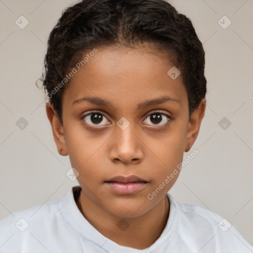 Joyful white child female with short  brown hair and brown eyes