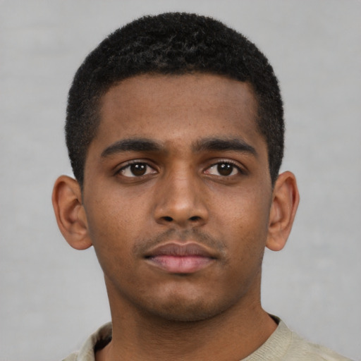 Neutral black young-adult male with short  brown hair and brown eyes
