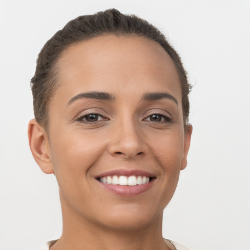 Joyful white young-adult female with short  brown hair and brown eyes