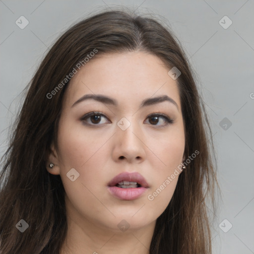 Neutral white young-adult female with long  brown hair and brown eyes