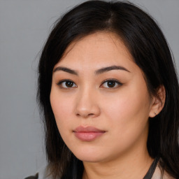 Neutral asian young-adult female with medium  brown hair and brown eyes