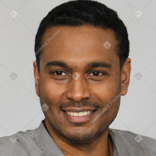 Joyful latino young-adult male with short  black hair and brown eyes
