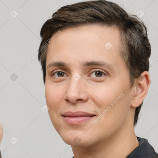 Joyful white young-adult female with short  brown hair and brown eyes