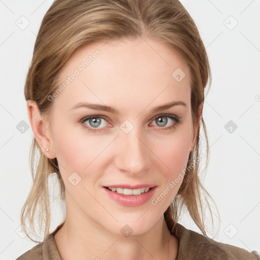 Joyful white young-adult female with medium  brown hair and blue eyes