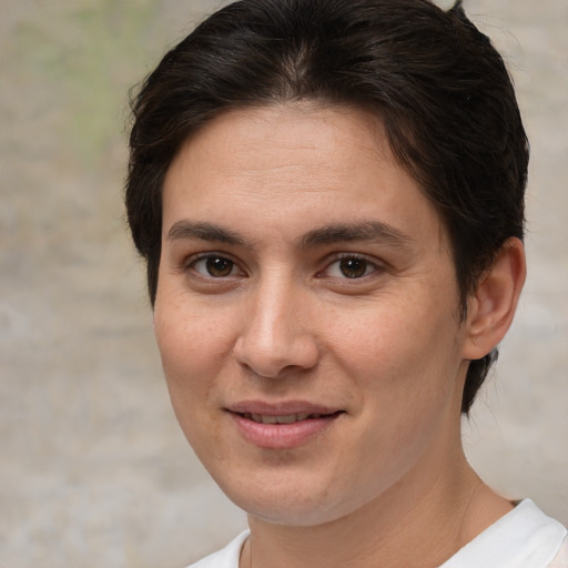 Joyful white young-adult female with medium  brown hair and brown eyes